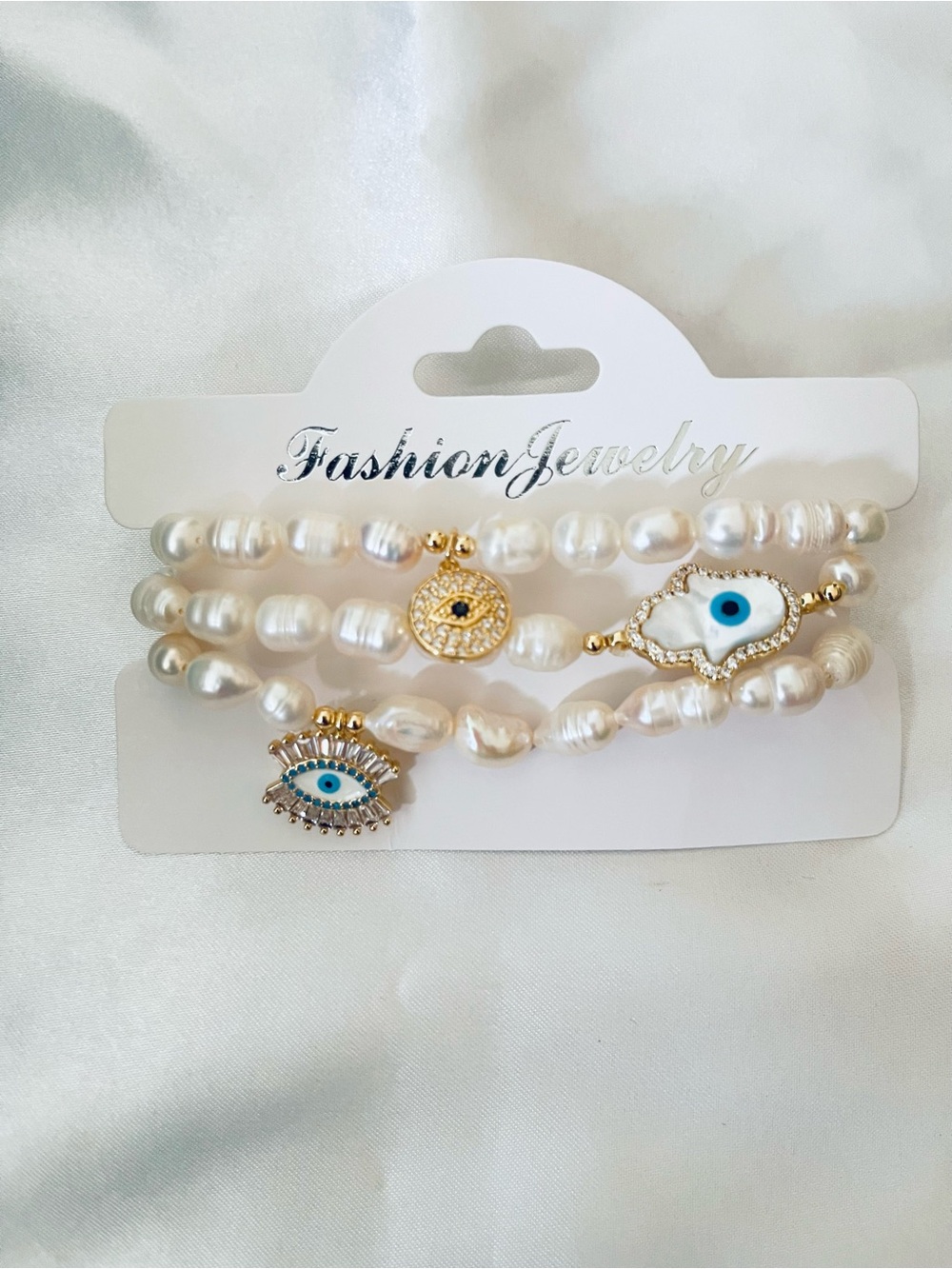Fashion Jewelry White Pearl Bracelet Set with Gold and Blue Evil Eye Charms